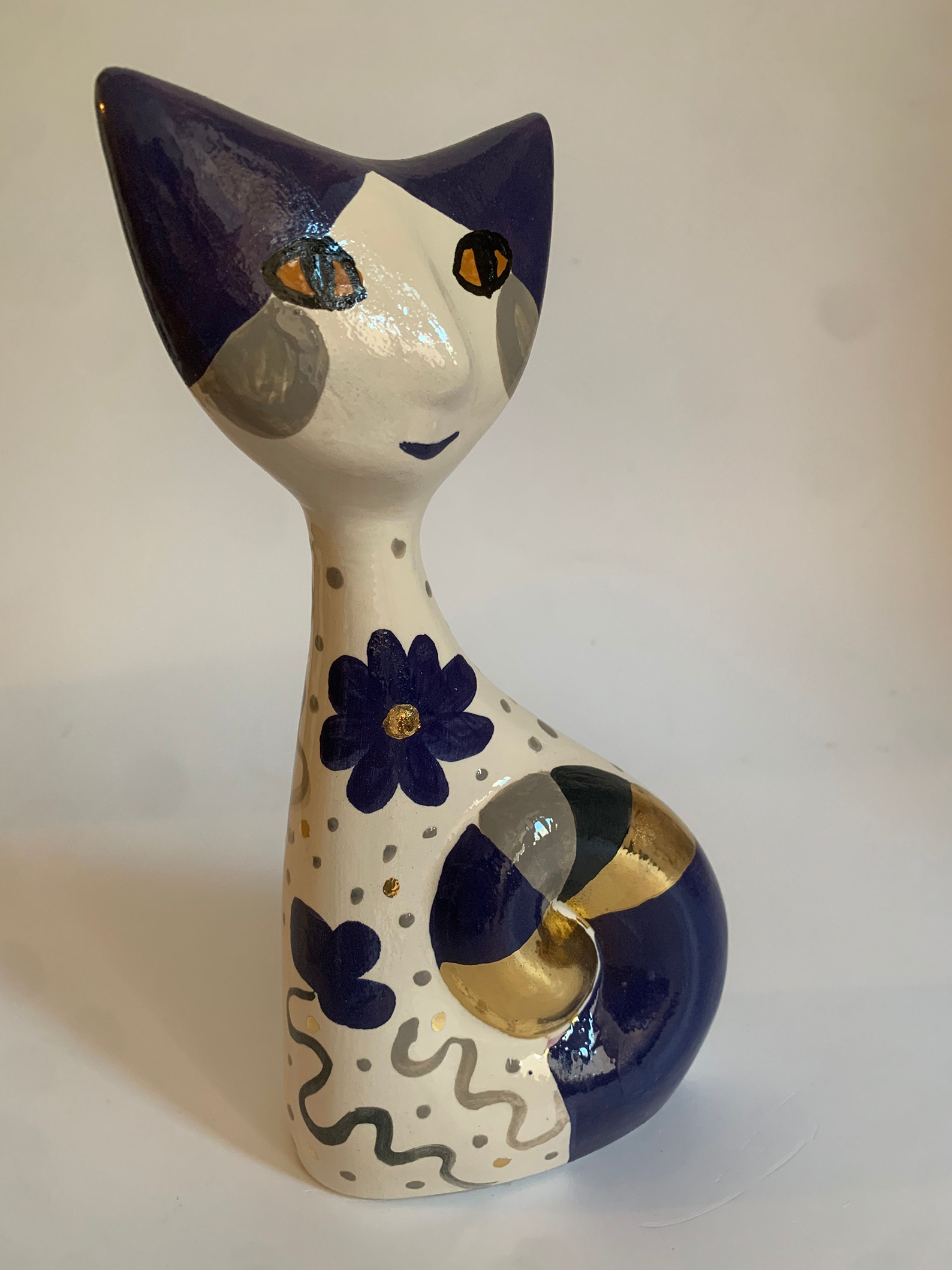 Battista Rea: gatto blu con fiori